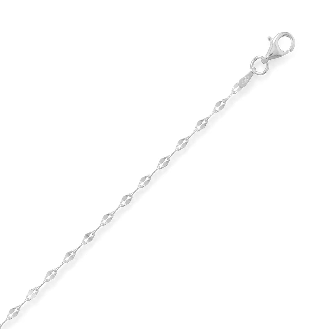 Indulge in the exquisite Sterling Silver 030 Coffee Chain Necklace, crafted in Italy from .925 sterling silver. Its delicate coffee bean-shaped links and lobster clasp closure exude luxury and security. Available in various lengths, this versatile piece is perfect for layering and adding elegance to any outfit. A must-have for any jewelry collection. Available in sizes 14-30 inches.