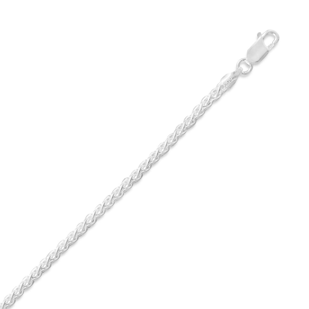 Indulge in the exquisite 2.5mm French Wheat Chain Necklace, crafted in Italy with .925 Sterling Silver. Its unique design, resembling wheat stalks, adds elegance and durability. Available in various lengths, it's perfect for anyone seeking a personalized look. A must-have for fine jewelry lovers.