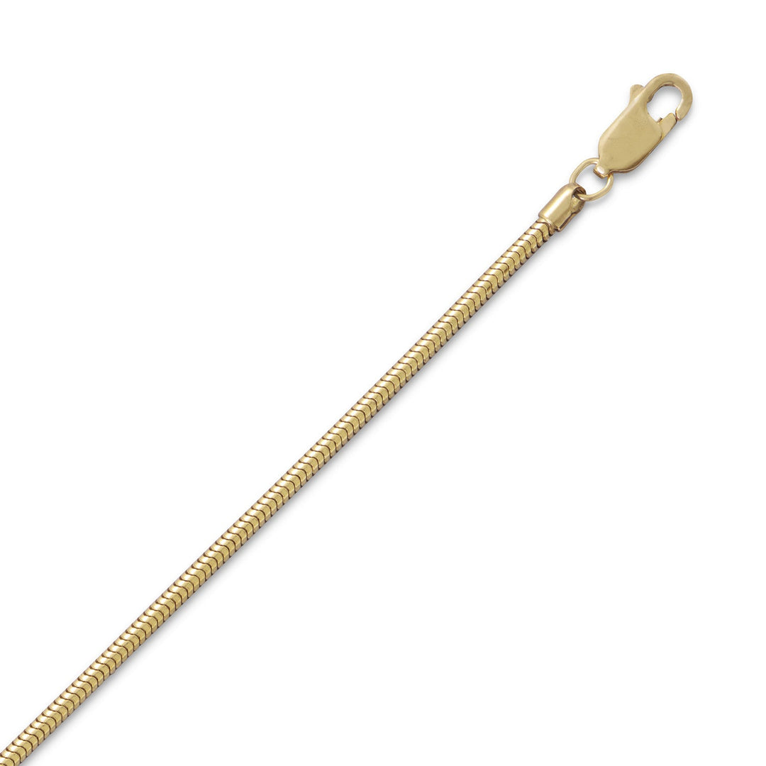 Indulge in the opulence of our 2mm 14/20 gold filled snake chain. Its sleek design exudes elegance and sophistication, while the gold filling adds value and beauty. Finished with a lobster clasp closure for safety and security, this chain has a variety of lengths that measure 16-30 inches. Wear it alone or pair it with any of our exquisite gold charms or pendants. Crafted from .925 sterling silver, this chain is a true luxury statement piece.