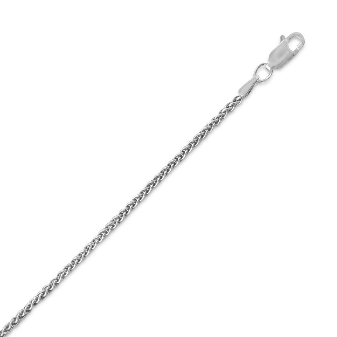 Indulge in the exquisite beauty of our oxidized 1.8 mm sterling silver chain, crafted from .925 sterling silver for a premium quality finish. Its unique French wheat design adds elegance and sophistication to any outfit. With a lobster clasp closure, safety and security are ensured. This versatile piece can be worn alone or layered with other necklaces, and paired with any of our sterling silver charms or pendants for a truly personalized look.