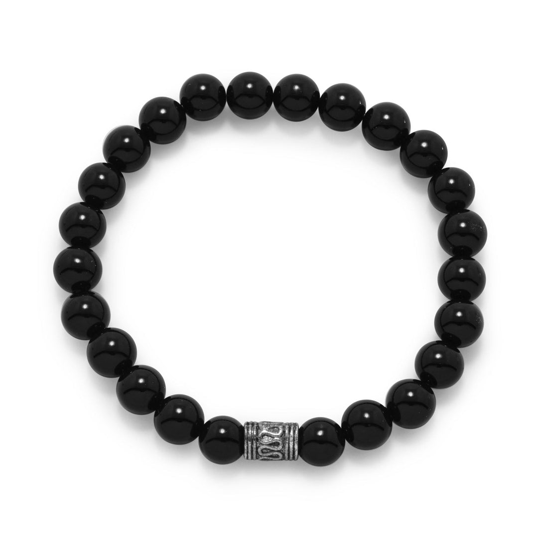 8mm black onyx and silver tone base metal bead fashion stretch bracelet. The base metal bead may vary from bead pictured. Bracelet measures approximately 8" around.  Fashion jewelry contains base metal.